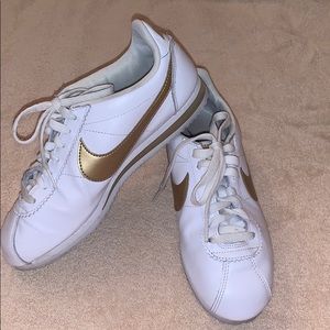 White/Gold women’s Nike’s